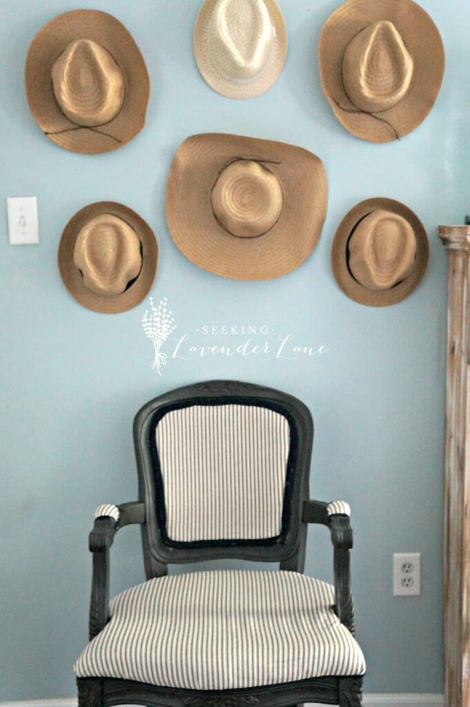 Straw Hat Gallery Wall on Blue Wall