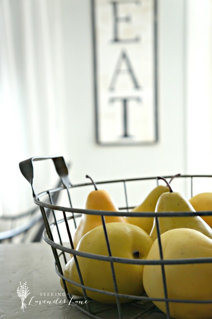 EAT sign and close up pears