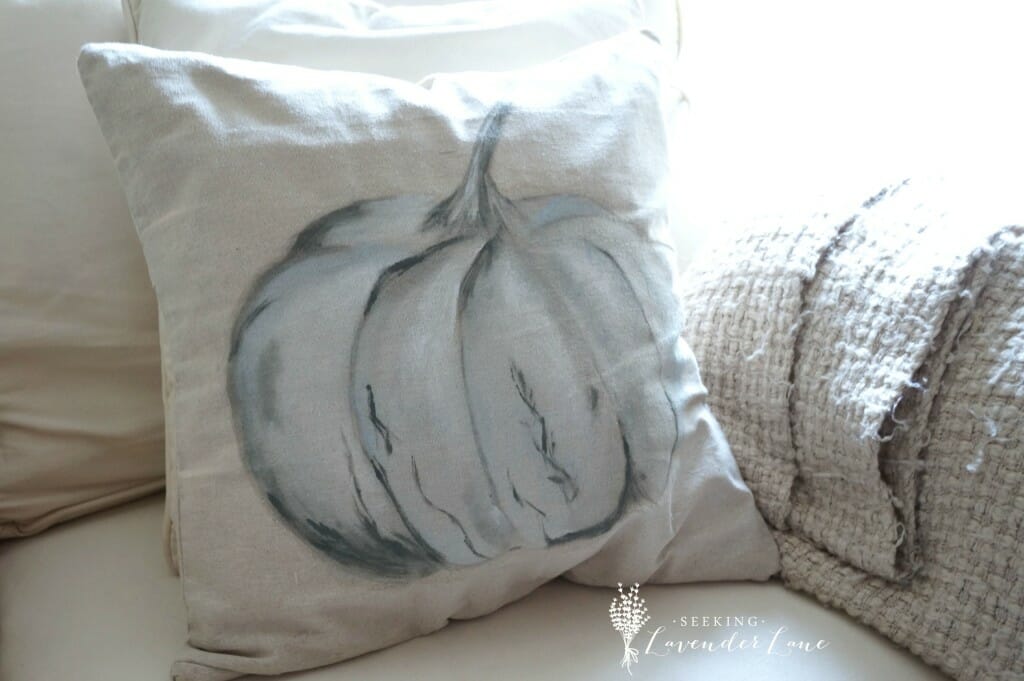 Pumpkin pillow on couch