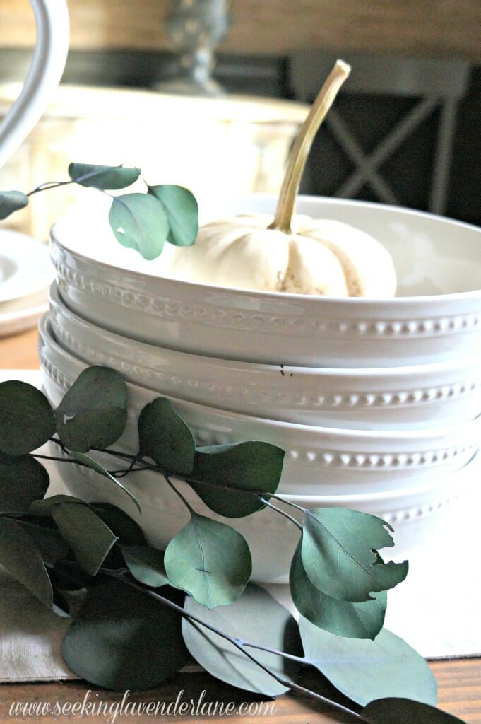 White dishes and eucalyptus