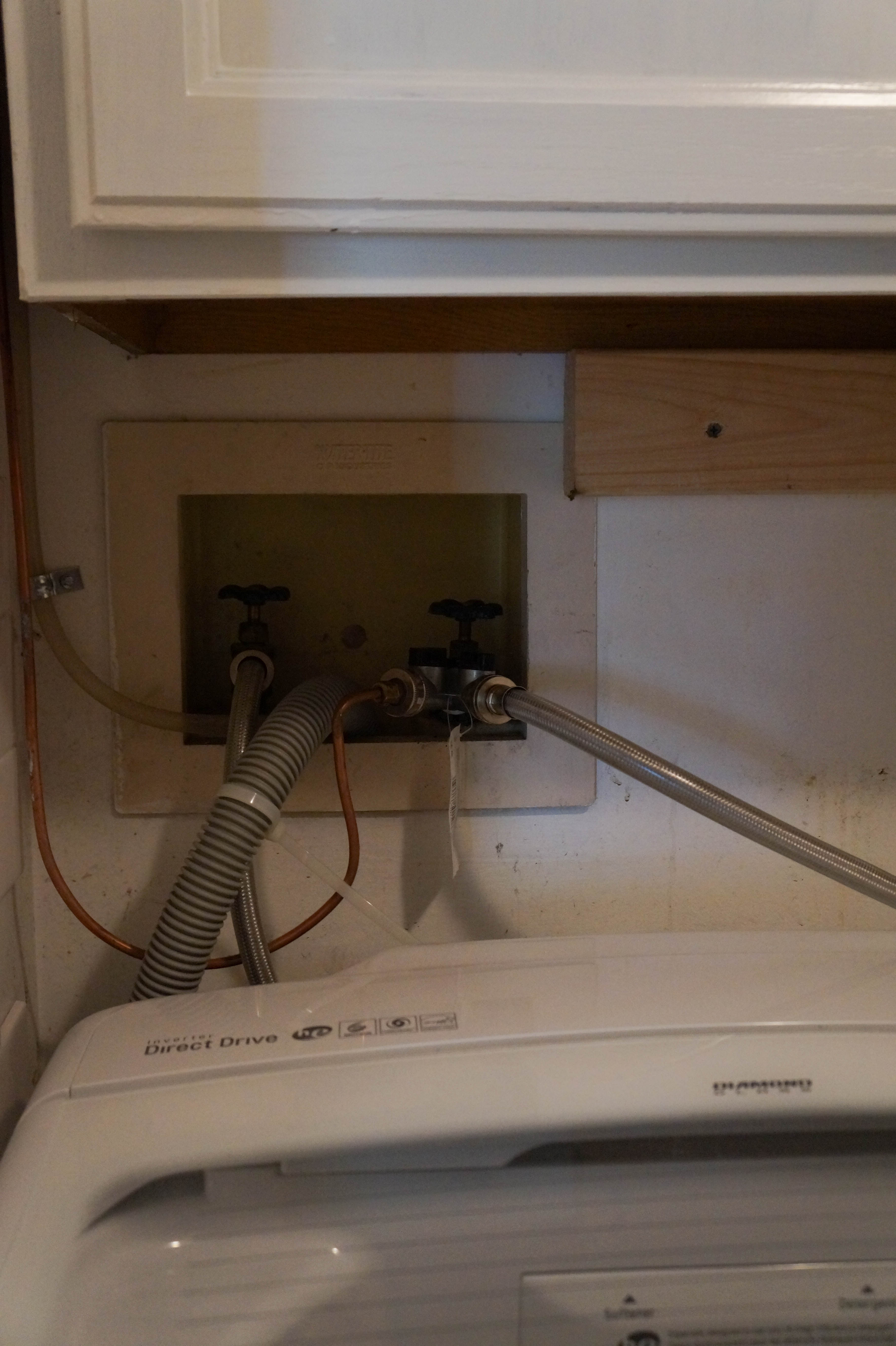 how-to-hide-ugly-pipes-in-laundry-room-9