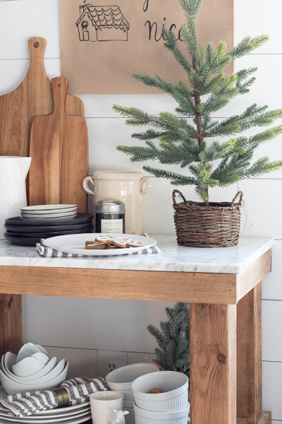 Create warmth in a white kitchen using cutting boards - Duke Manor Farm by  Laura Janning